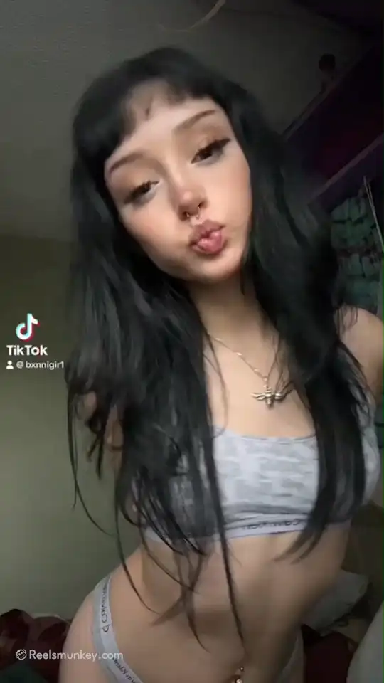 Brunette With Spider Tattoo Reveals Her Small Tits While Dancing