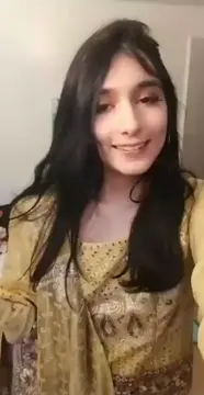 Admiring herself in the mirror