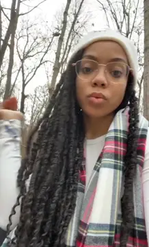 Ebony fucks herself in the woods